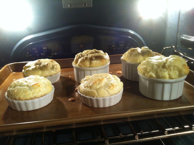 The soufflés begin their rise to stardom in the oven. 