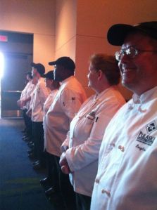 Students and faculty line both sides of the doors while welcoming Diamond Chef guests. 